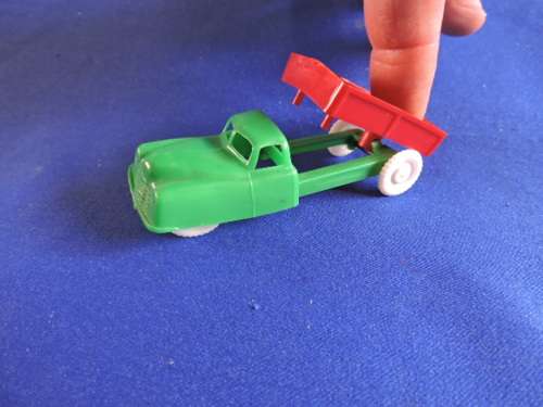South African plastic toy truck. Not Dinky Corgi Matchbox or Hot Wheel (Green cab Red bin)