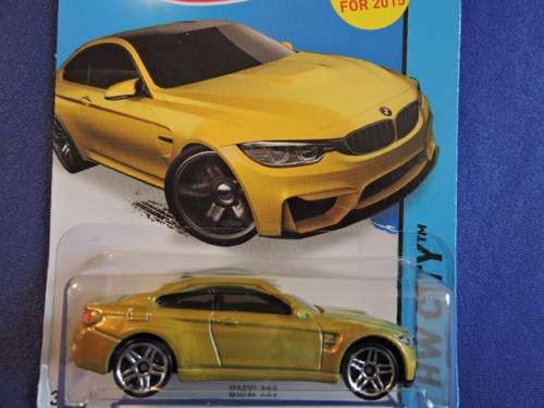 Hot Wheels BMW M4 ( Metalic gold/yellow ).....