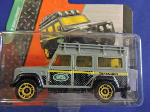 Matchbox Land Rover Defender 110 ( Grey black yellow stripe )  Like Hot Wheels...