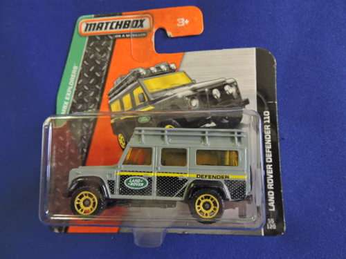 Matchbox Land Rover Defender 110 ( Grey black yellow stripe )  Like Hot Wheels...