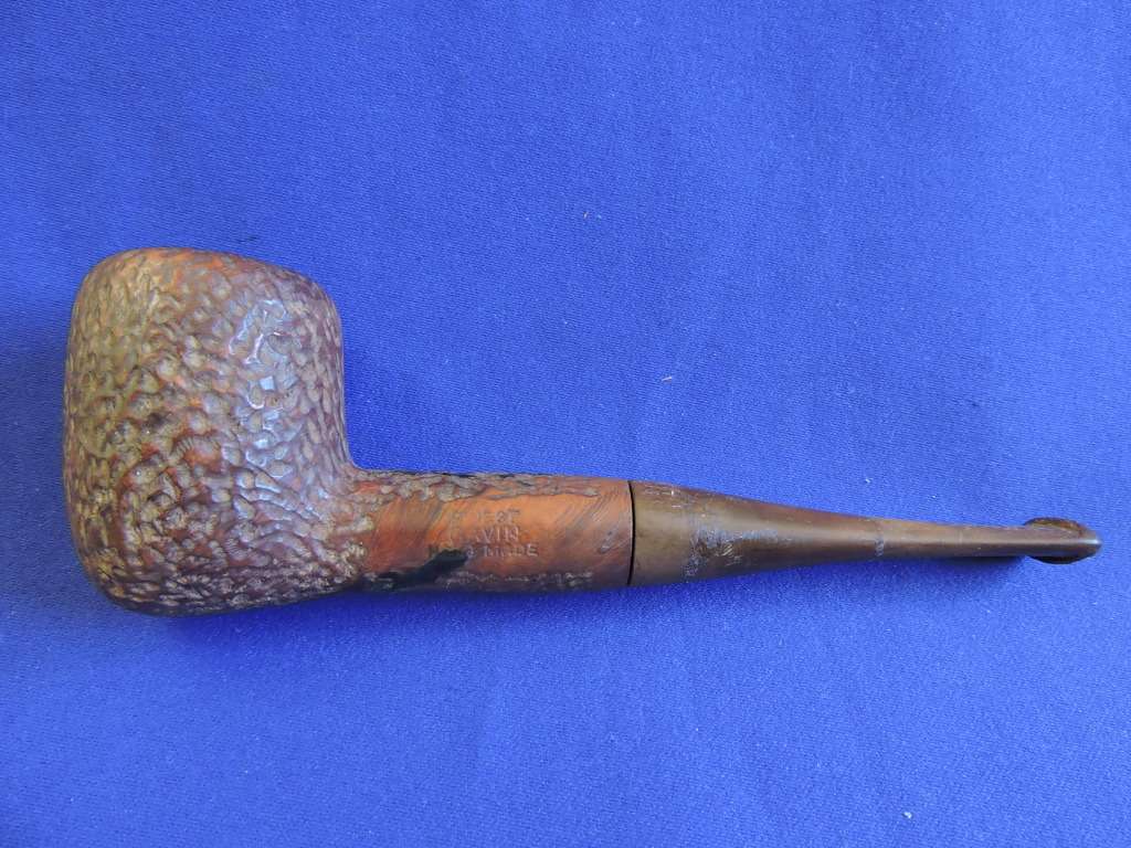 Vintage smoking pipe with Springbok tabak sak and leather tobacco pouch.