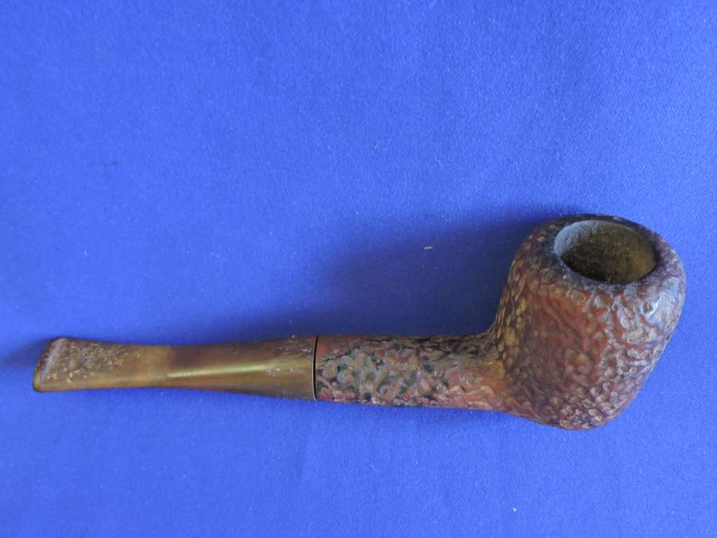 Vintage smoking pipe with Springbok tabak sak and leather tobacco pouch.