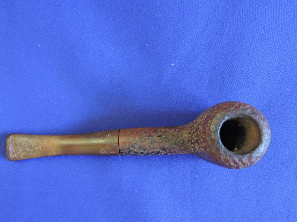 Vintage smoking pipe with Springbok tabak sak and leather tobacco pouch.