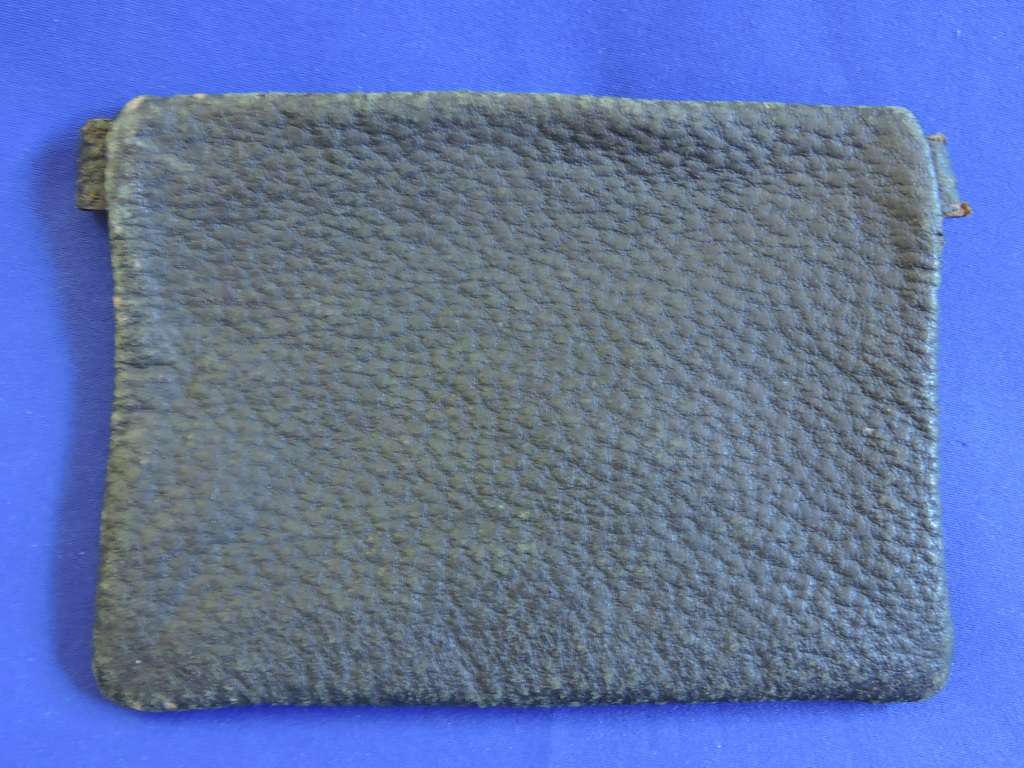 Vintage smoking pipe with Springbok tabak sak and leather tobacco pouch.