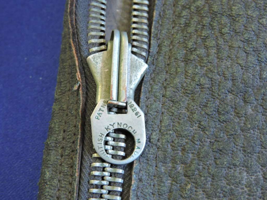 Vintage smoking pipe with Springbok tabak sak and leather tobacco pouch.