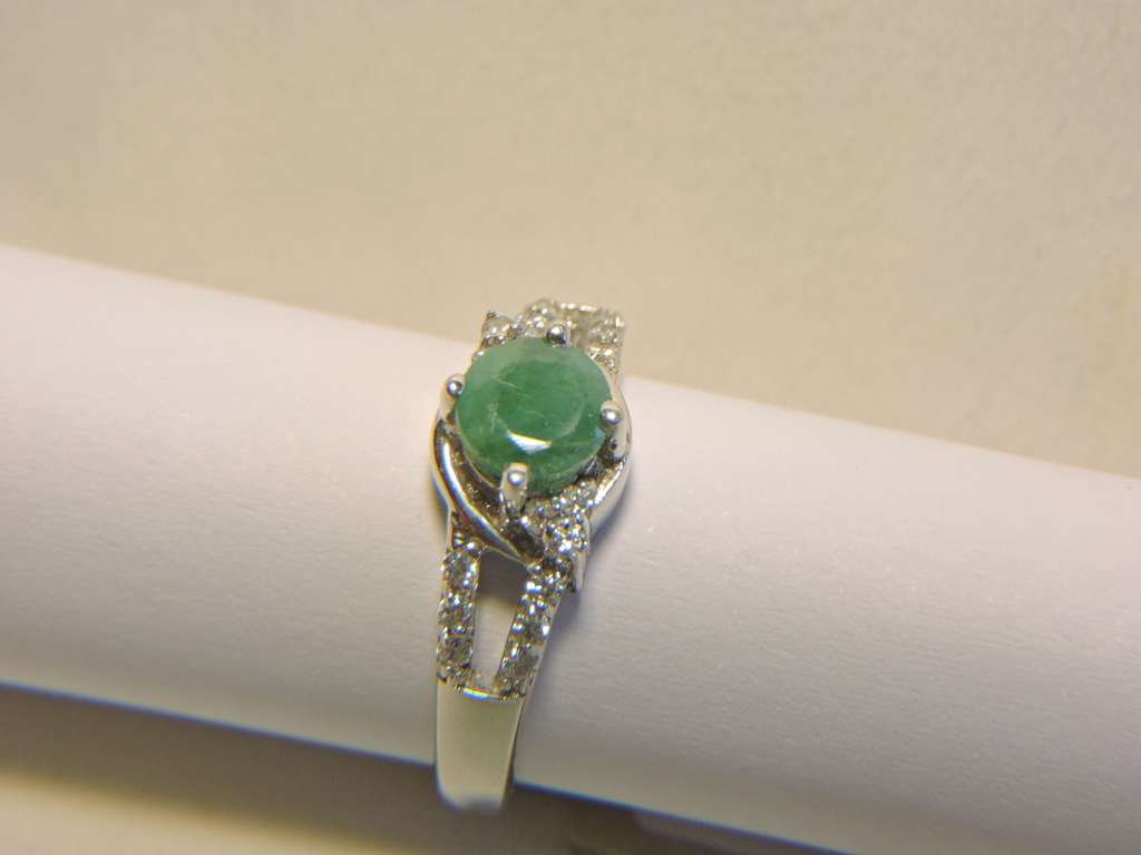 Sterling Silver Emerald & Zirconia (green stone) ring.