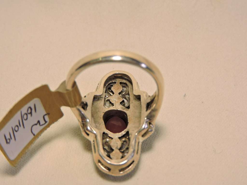 Sterling Silver Ruby & Marquisate (red stone) ring.