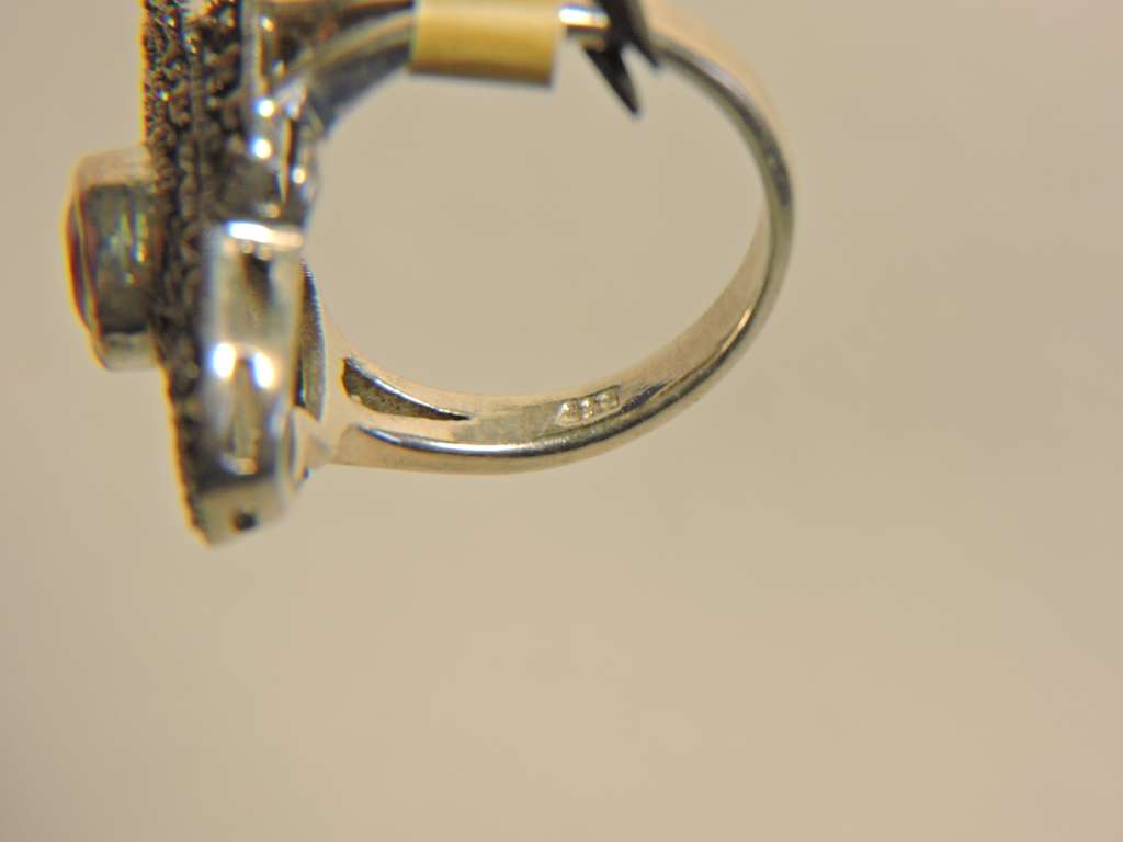 Sterling Silver Ruby & Marquisate (red stone) ring.