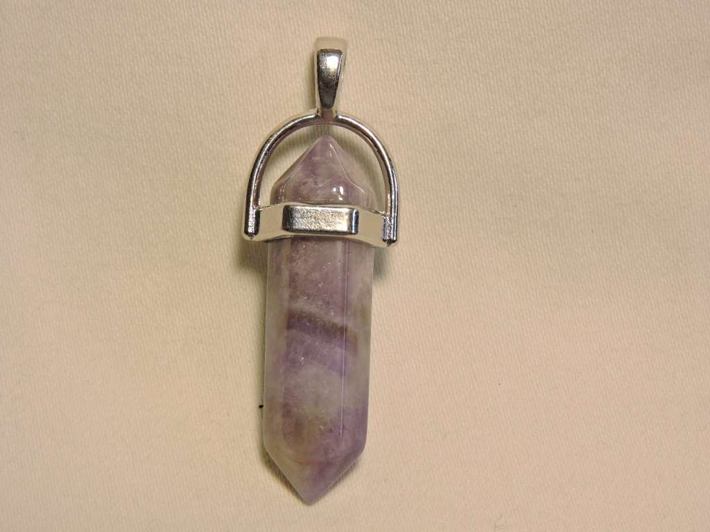 Contemporary Amethyst pendant ( crystal cut purple stone pendant).