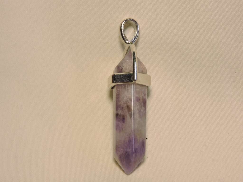 Contemporary Amethyst pendant ( crystal cut purple stone pendant).