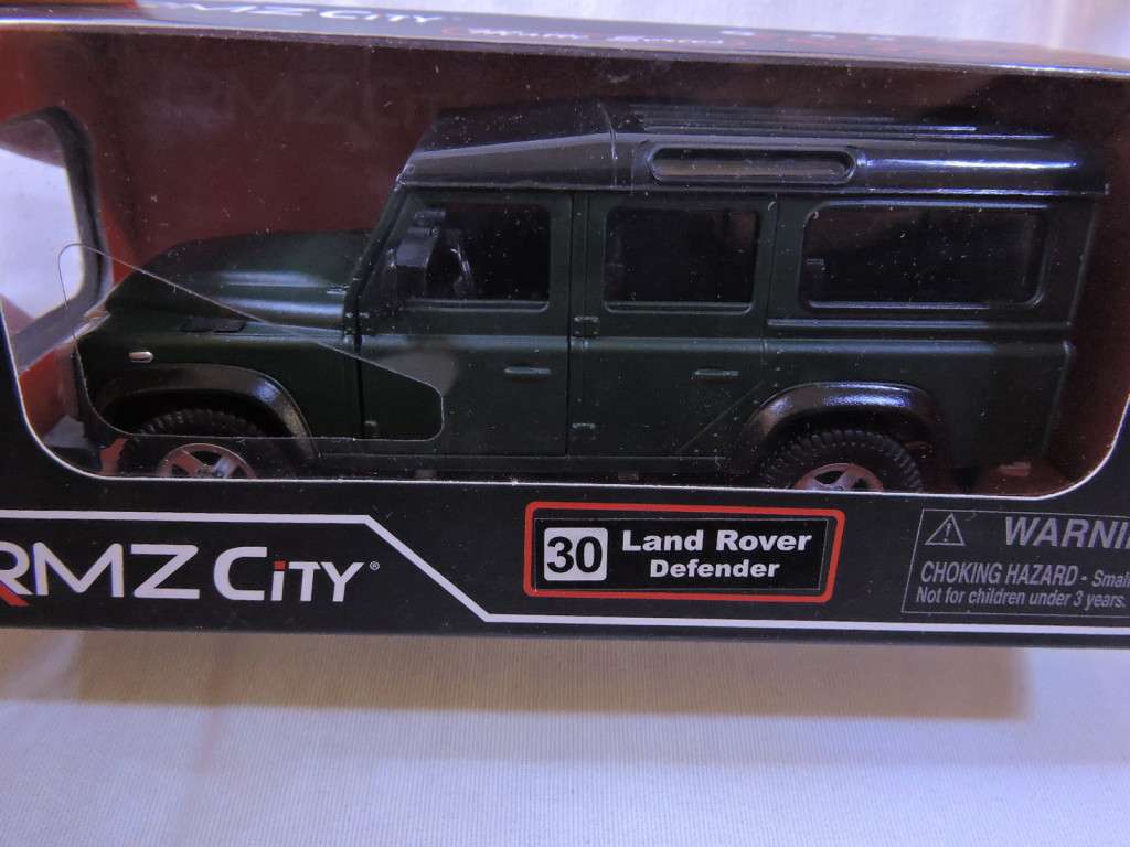 Land Rover Defender  Mint in Box   ( Bottle Green )