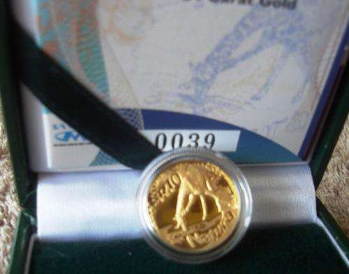 GIRAFFE 2006 TENTH OUNCE GOLD NATURA COIN.