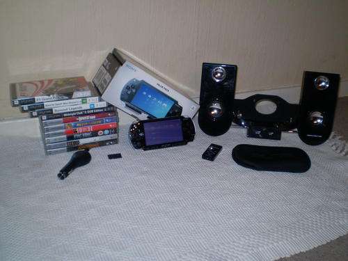 SONY PSP + Dock Station + 4 Games & 6 Movies and MORE!!!
