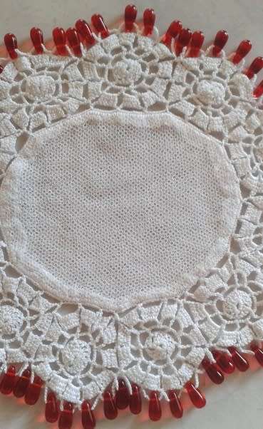 Red glass teardrop beaded doilie net centre
