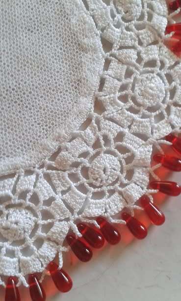 Red glass teardrop beaded doilie net centre