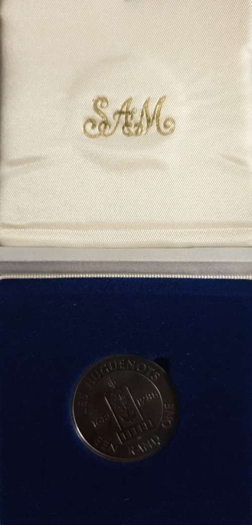 1988 Protea R1 : Les Hugenote 1 Rand Coin in blue SAM box