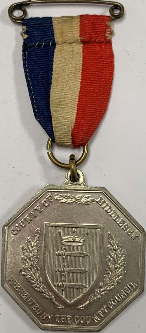 Real Silver Jubilee Medal of King George V and Queen Mary.