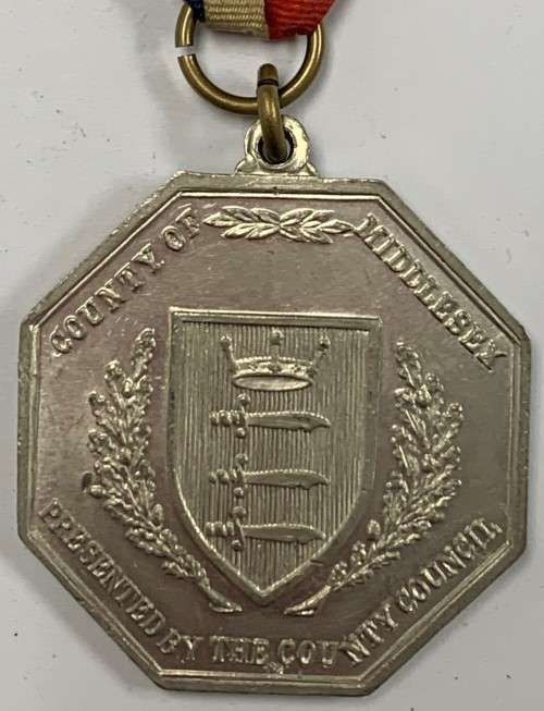 Real Silver Jubilee Medal of King George V and Queen Mary.