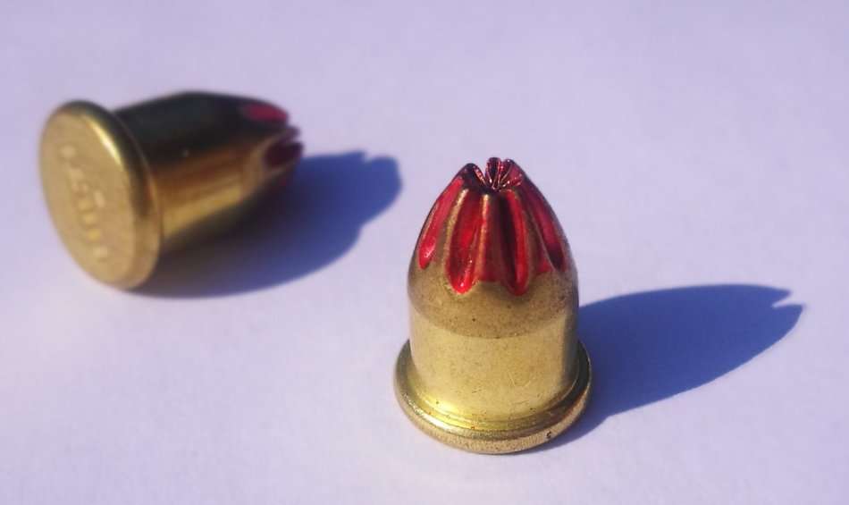 STRIP OF 10 RED HILTI CAPS. (.27 CAL SHORT). CAN BE USED FOR TRIP WIRE BANG REFILLS.