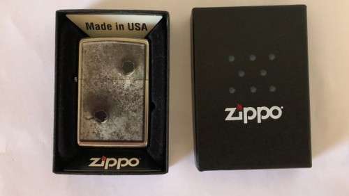 Zippo bullet holes.