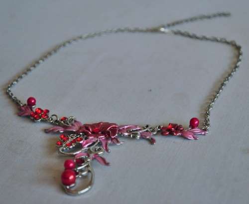 Vintage silver tone necklace with pink and red enamel and stones
