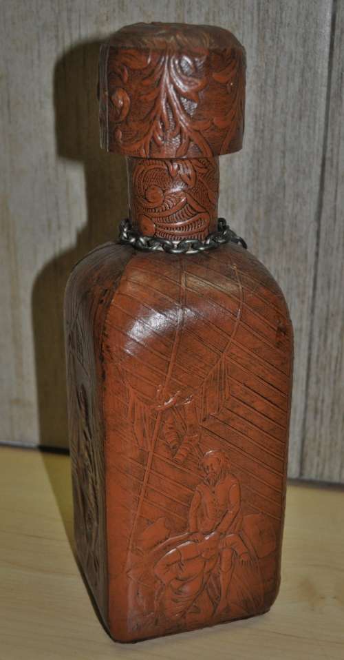 Vintage Miguel de Cervantes embossed Leather wrapped liquor bottle/decanter. Hand-made in Spain