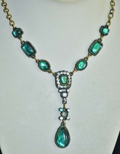 Vintage brass costume jewellery necklace with green and clear crystal