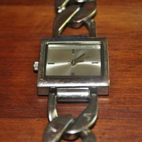 Sturdy stainless steel with linked chain strap, unbranded ladies watch