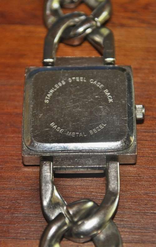 Sturdy stainless steel with linked chain strap, unbranded ladies watch