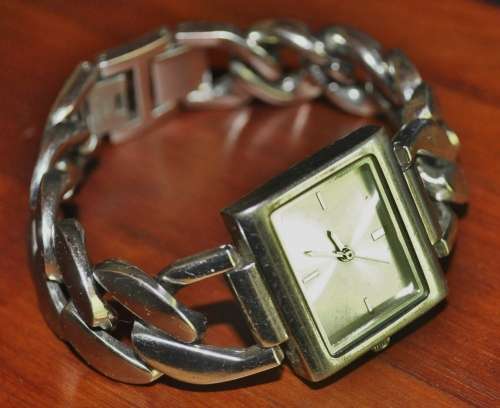 Sturdy stainless steel with linked chain strap, unbranded ladies watch