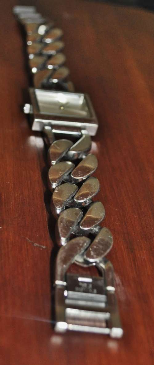 Sturdy stainless steel with linked chain strap, unbranded ladies watch