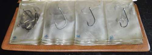 Job Lot - Booklet filled with Mustad Fishing Hooks and Barrel Swivels