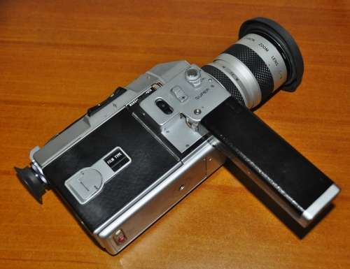 Super-8 Canon cine camera Auto Zoom 814 cased, cap, manual, and 3 extra Soligor lenses