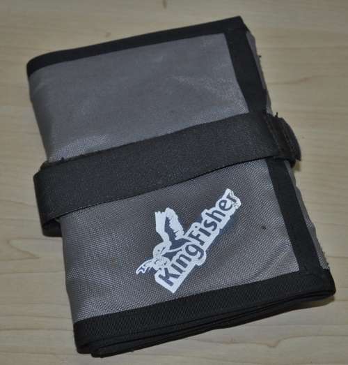 Kingfisher Sail Pouch with variety of traces, Mustad hooks, a Lure, Lead sinkers, and more