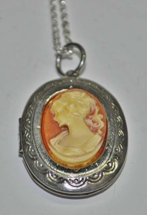 Vintage Victorian style silver tone Cameo locket necklace signed by AVON jewellery producer SAQ