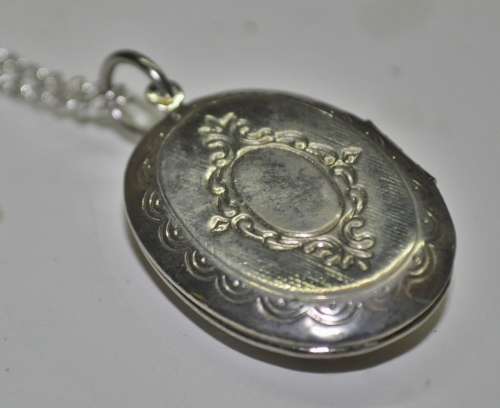 Vintage Victorian style silver tone Cameo locket necklace signed by AVON jewellery producer SAQ