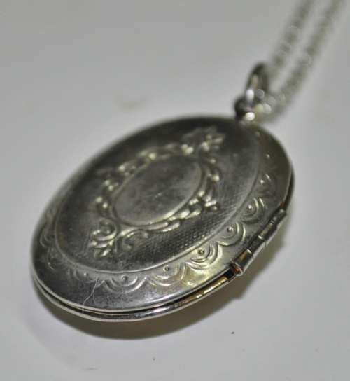 Vintage Victorian style silver tone Cameo locket necklace signed by AVON jewellery producer SAQ