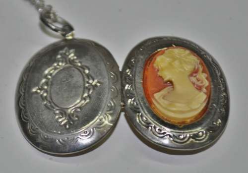 Vintage Victorian style silver tone Cameo locket necklace signed by AVON jewellery producer SAQ