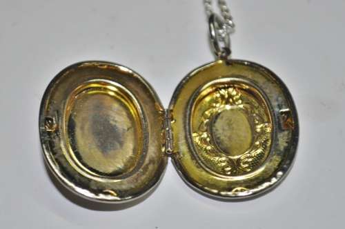 Vintage Victorian style silver tone Cameo locket necklace signed by AVON jewellery producer SAQ