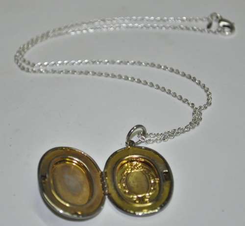 Vintage Victorian style silver tone Cameo locket necklace signed by AVON jewellery producer SAQ