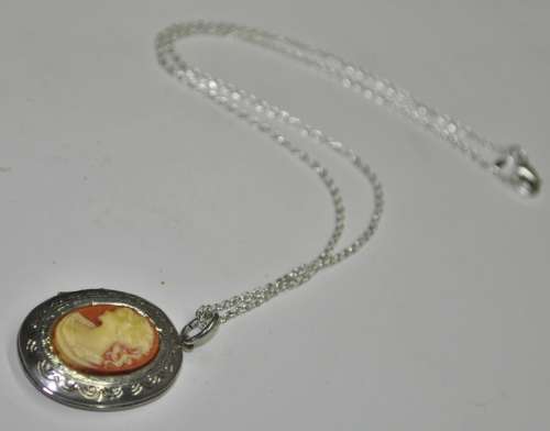 Vintage Victorian style silver tone Cameo locket necklace signed by AVON jewellery producer SAQ