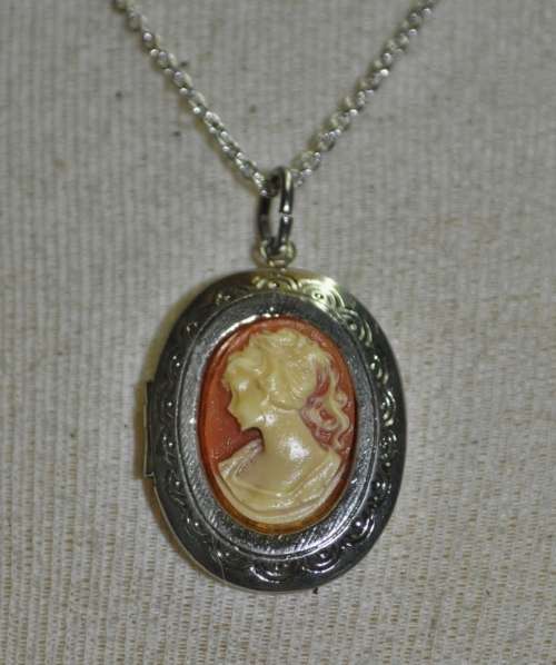 Vintage Victorian style silver tone Cameo locket necklace signed by AVON jewellery producer SAQ