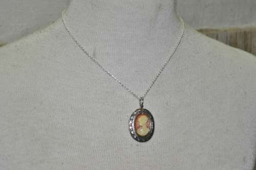 Vintage Victorian style silver tone Cameo locket necklace signed by AVON jewellery producer SAQ