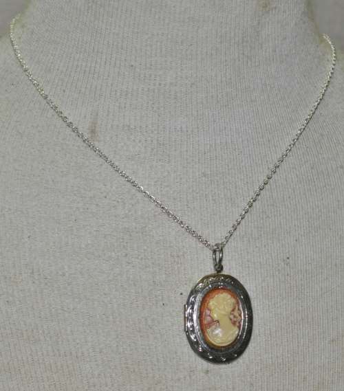 Vintage Victorian style silver tone Cameo locket necklace signed by AVON jewellery producer SAQ
