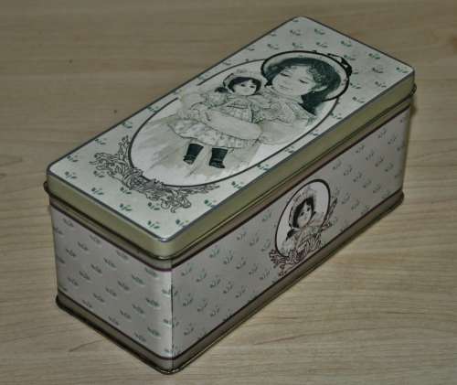 Vintage General Storage Tin Decorated with a Girl and her Doll made in Hong Kong for The B+J Co. USA