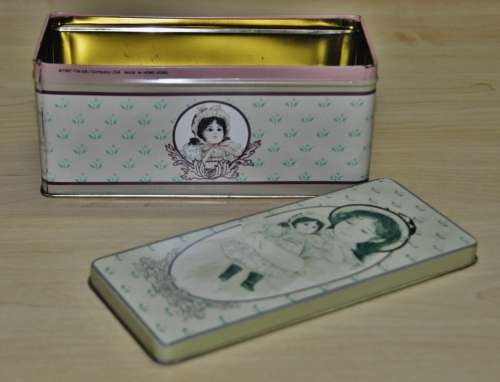 Vintage General Storage Tin Decorated with a Girl and her Doll made in Hong Kong for The B+J Co. USA
