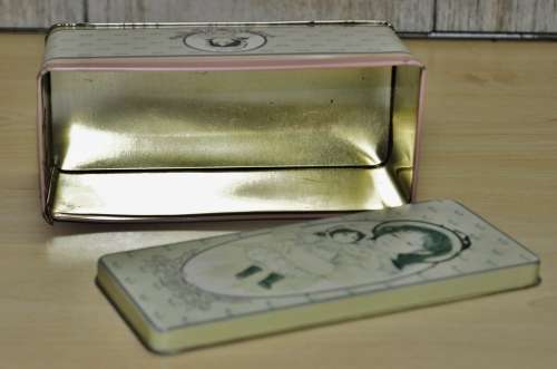 Vintage General Storage Tin Decorated with a Girl and her Doll made in Hong Kong for The B+J Co. USA