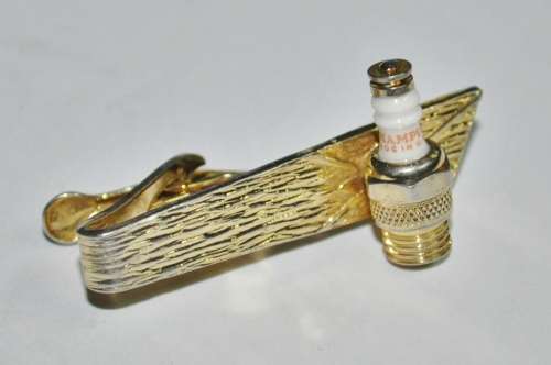 Vintage Gold Tone Tie Clip with Spark Plug Marked Champion Made in the USA