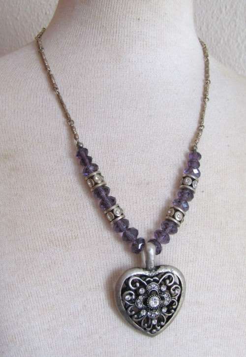 Vintage silver tone heart pendant necklace with clear and purple faceted crystal