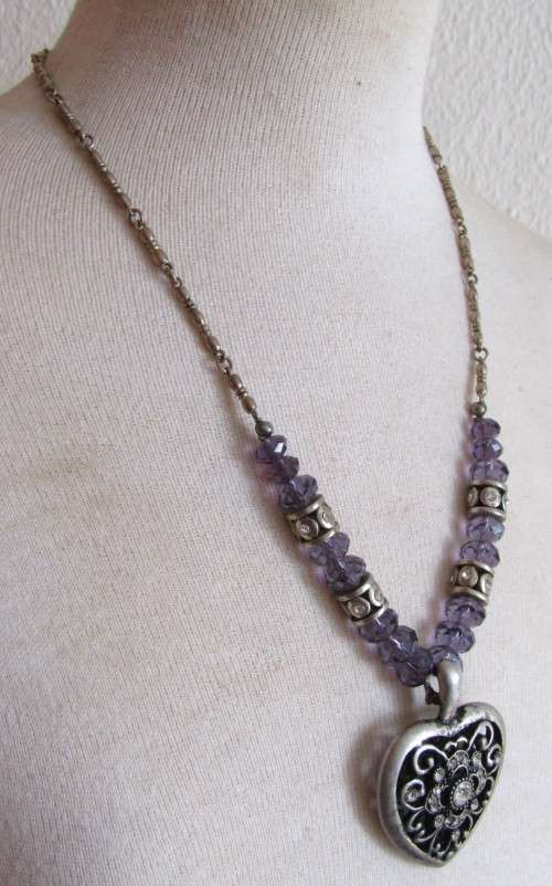 Vintage silver tone heart pendant necklace with clear and purple faceted crystal